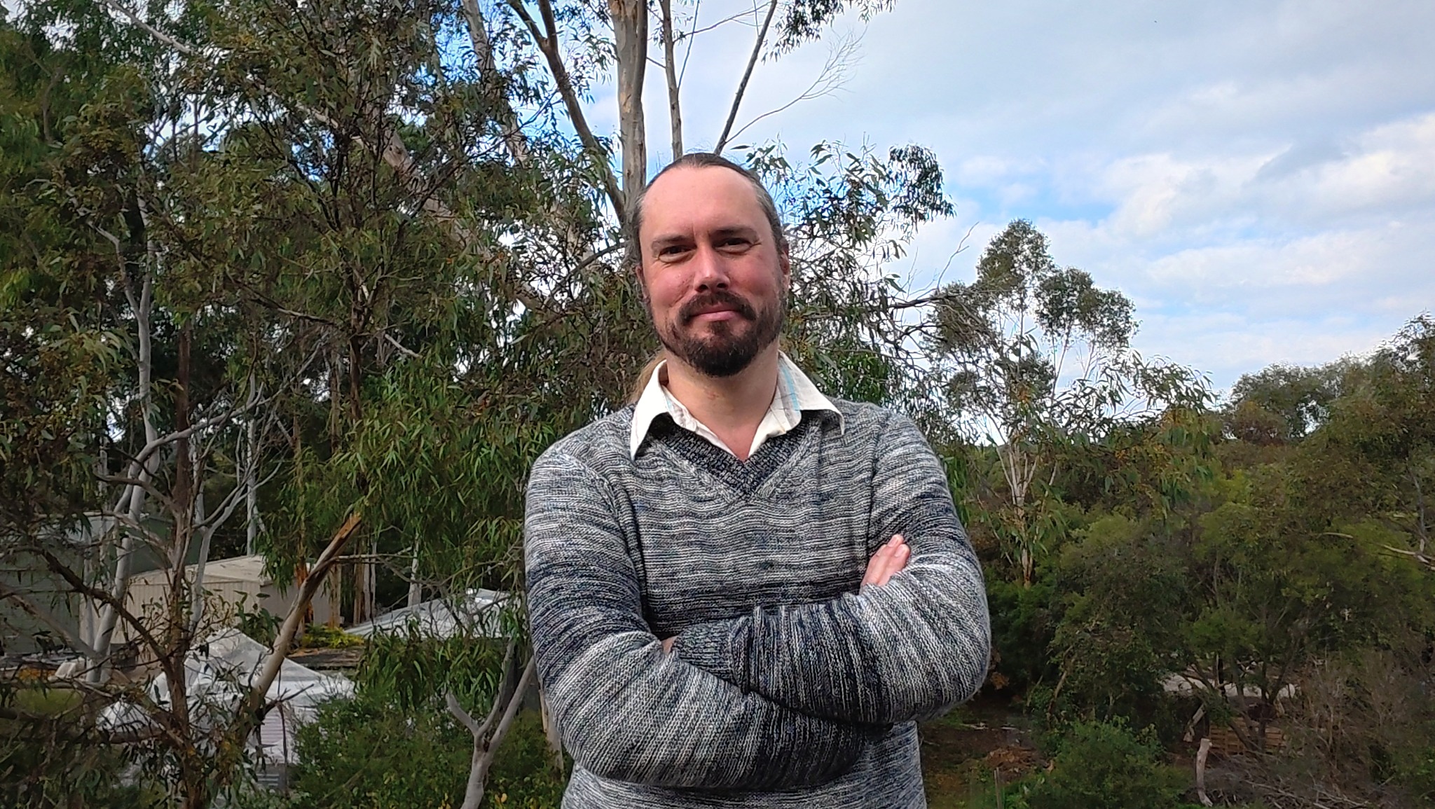 Chris Stedman standing outdoors